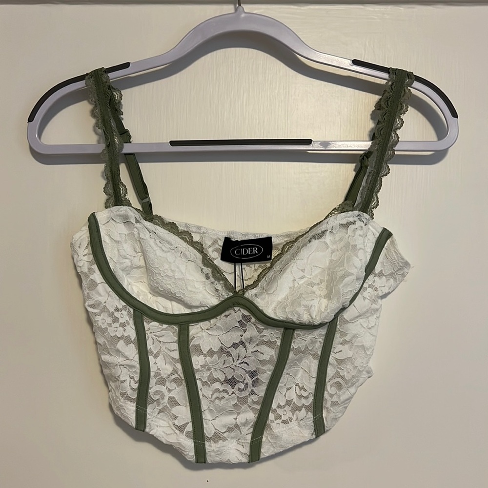 NEVER WORN with tags CIDER White Lace Corset with Green trim. Size M.
